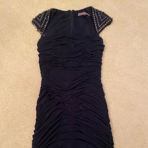Blue cocktail dress with gems on shoulders